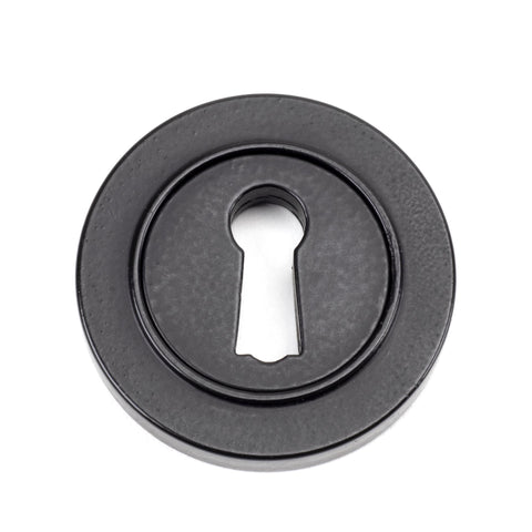 From The Anvil's Matt Black Round Escutcheon