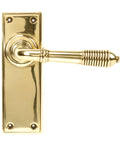 From The Anvil's Aged Brass Reeded Lever Latch Set