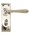 From The Anvil's Polished Nickel Reeded Lever Bathroom Set