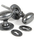 From The Anvil's Pewter Patina Oval Mortice/Rim Knob Set