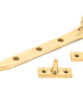 From The Anvil's Polished Brass Peardrop Stay