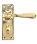 From The Anvil's Aged Brass Hinton Lever Bathroom Set