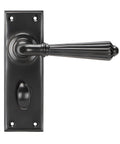 From The Anvil's Aged Bronze Hinton Lever Bathroom Set