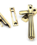 From The Anvil's Aged Brass Locking Hinton Fastener