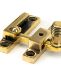 From The Anvil's Aged Brass Beehive Quadrant Fastener - Narrow