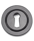 From The Anvil's Black Round Escutcheon