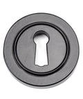 From The Anvil's Black Round Escutcheon