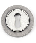 From The Anvil's Pewter Patina Round Escutcheon