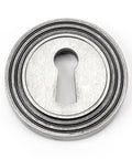 From The Anvil's Pewter Patina Round Escutcheon