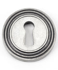 From The Anvil's Pewter Patina Round Escutcheon