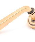 From The Anvil's Polished Bronze Avon Round Lever on Rose Set (Sprung)