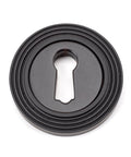 From The Anvil's Aged Bronze Round Escutcheon
