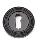 From The Anvil's Aged Bronze Round Escutcheon