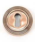 From The Anvil's Polished Bronze Round Escutcheon