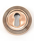 From The Anvil's Polished Bronze Round Escutcheon