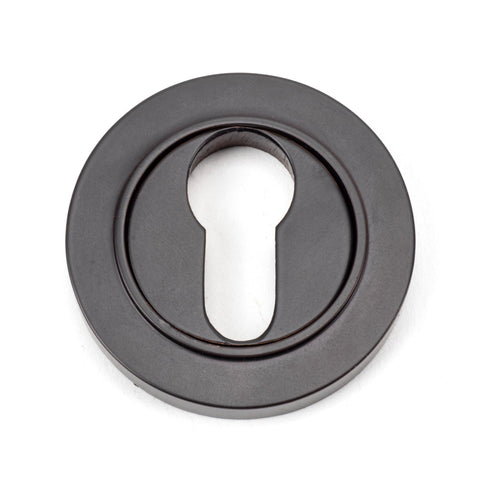 From The Anvil's Aged Bronze Round Euro Escutcheon