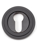 From The Anvil's Aged Bronze Round Euro Escutcheon