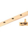 From The Anvil's Polished Bronze Brompton Stay