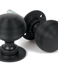 From The Anvil's Matt Black Heavy Beehive Mortice/Rim Knob Set