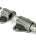 From The Anvil's Pewter Patina Fanlight Catch with Two Keeps