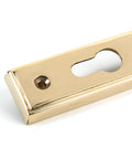 From The Anvil's Polished Brass Hinton Slimline Lever Espag. Lock Set