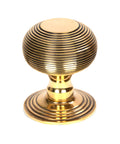 From The Anvil's Aged Brass Beehive Centre Door Knob