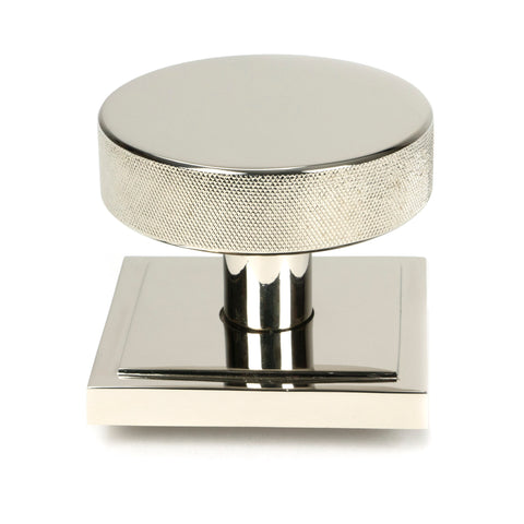 From The Anvil's Polished Nickel Brompton Centre Door Knob