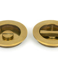 From The Anvil's Aged Brass Plain Round Pull - Privacy Set