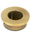 From The Anvil's Aged Brass Round Finger Edge Pull