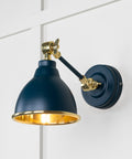 From The Anvil's Smooth Brass Smooth Brass Brindley Wall Light