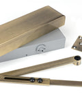 From The Anvil's Aged Brass Size 2-5 Door Closer