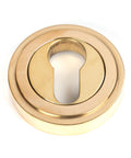 From The Anvil's Polished Brass Round Euro Escutcheon