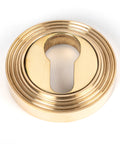 From The Anvil's Polished Brass Round Euro Escutcheon