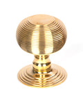 From The Anvil's Polished Brass Beehive Centre Door Knob