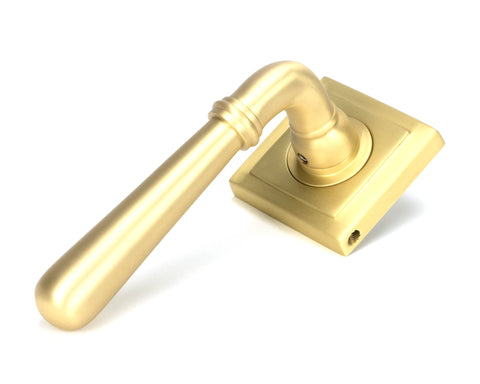 From The Anvil's Satin Brass Newbury Lever on Rose Set (Sprung)