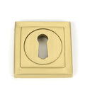 From The Anvil's Satin Brass Round Escutcheon