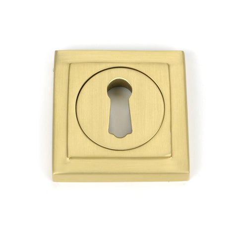 From The Anvil's Satin Brass Round Escutcheon