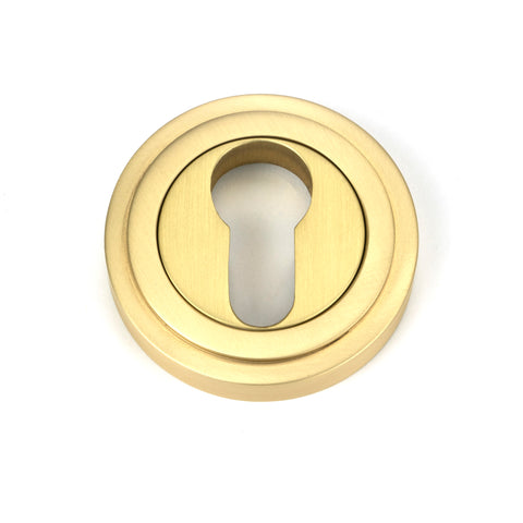 From The Anvil's Satin Brass Round Euro Escutcheon
