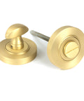 From The Anvil's Satin Brass Round Thumbturn Set