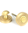 From The Anvil's Satin Brass Round Thumbturn Set