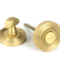 From The Anvil's Satin Brass Round Thumbturn Set