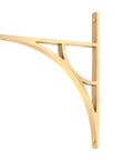 From The Anvil's Satin Brass Tyne Shelf Bracket