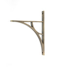 From The Anvil's Burnished Brass Tyne Shelf Bracket