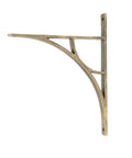 From The Anvil's Burnished Brass Tyne Shelf Bracket