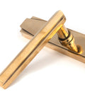 From The Anvil's Aged Brass Art Deco Slimline Lever Espag. Lock Set