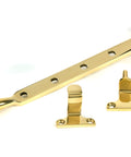 From The Anvil's Polished Brass Reeded Stay (Steel Window)