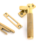 From The Anvil's Polished Brass Locking Brompton Fastener