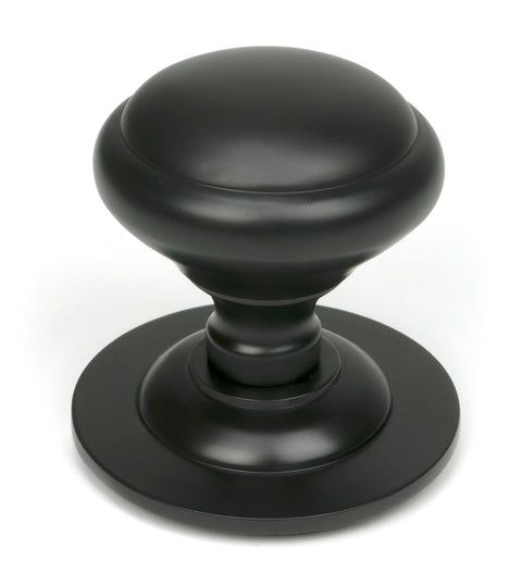 From The Anvil's Aged Bronze Round Centre Door Knob