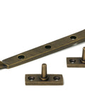 From The Anvil's Burnished Brass Brompton Stay