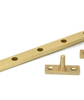 From The Anvil's Satin Brass Reeded Stay